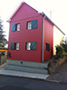 Rotes Holz am Haus